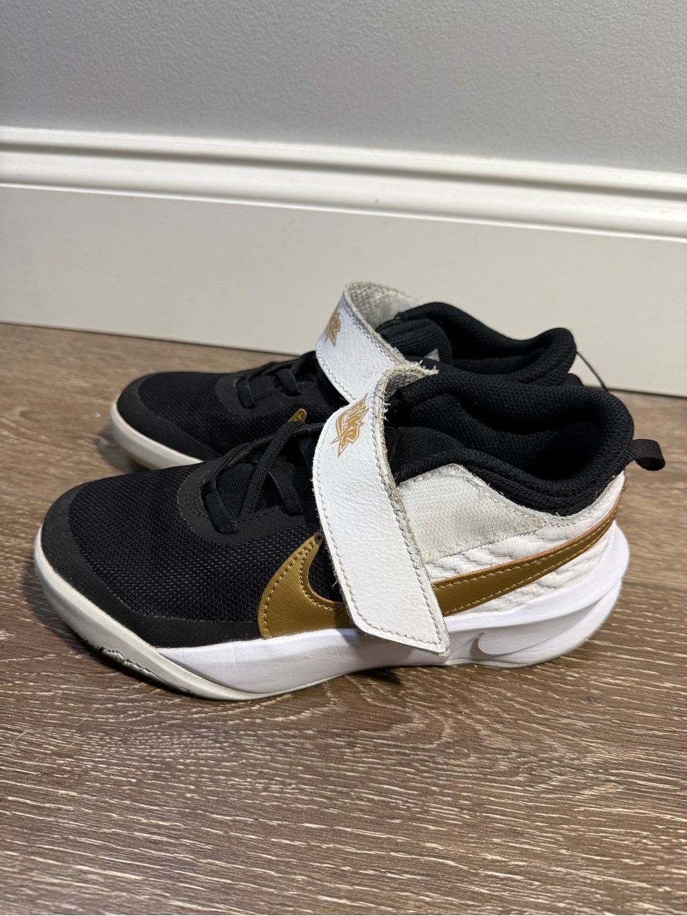 Nike Kids Black, White and Gold Velcro Strap Sneakers